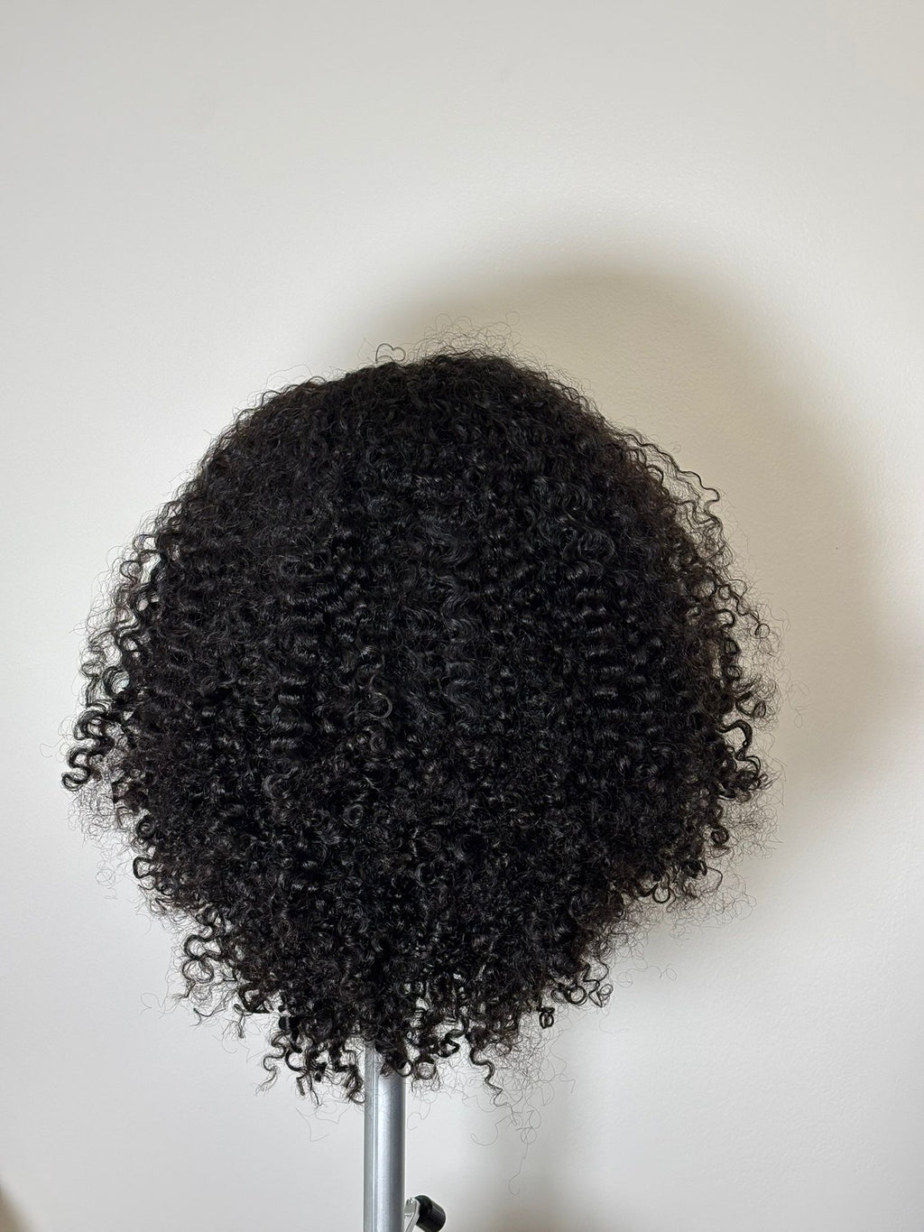 Perruque bouclée demi-tête